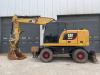 Caterpillar M314F with Outriggers Foto 1 thumbnail
