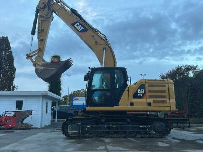 Caterpillar 323 E Foto 1