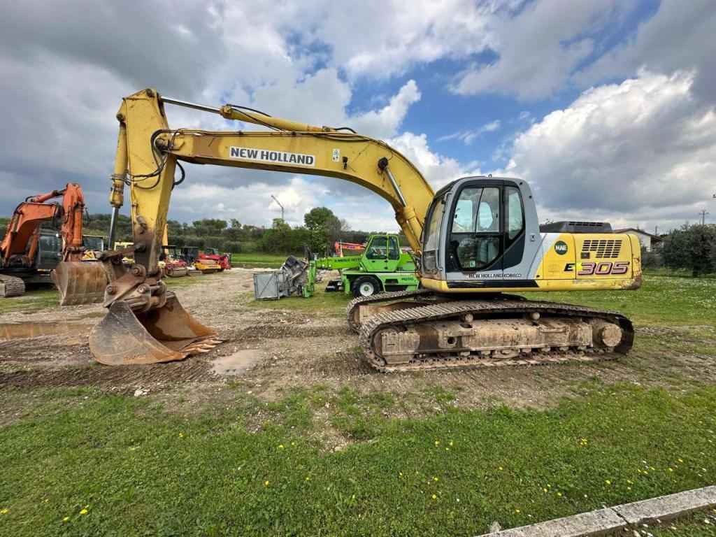 New Holland 305 Foto 1