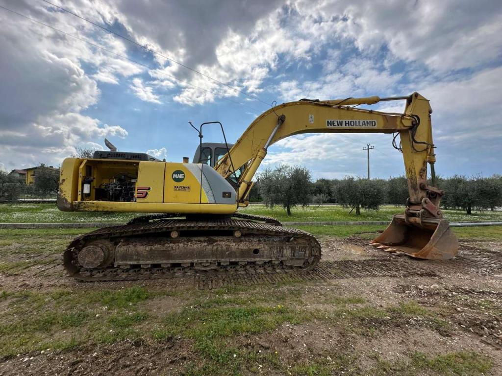 New Holland 305 Foto 10
