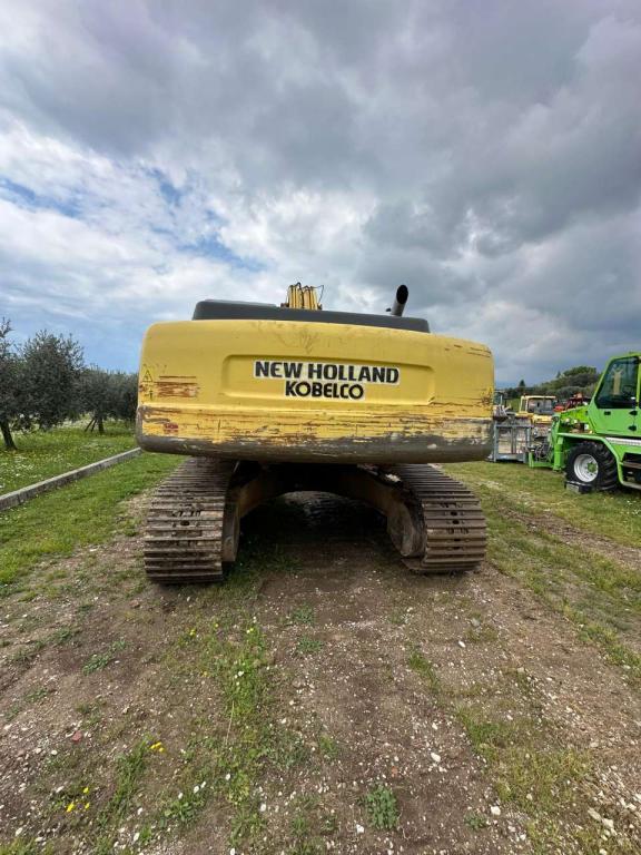 New Holland 305 Foto 11