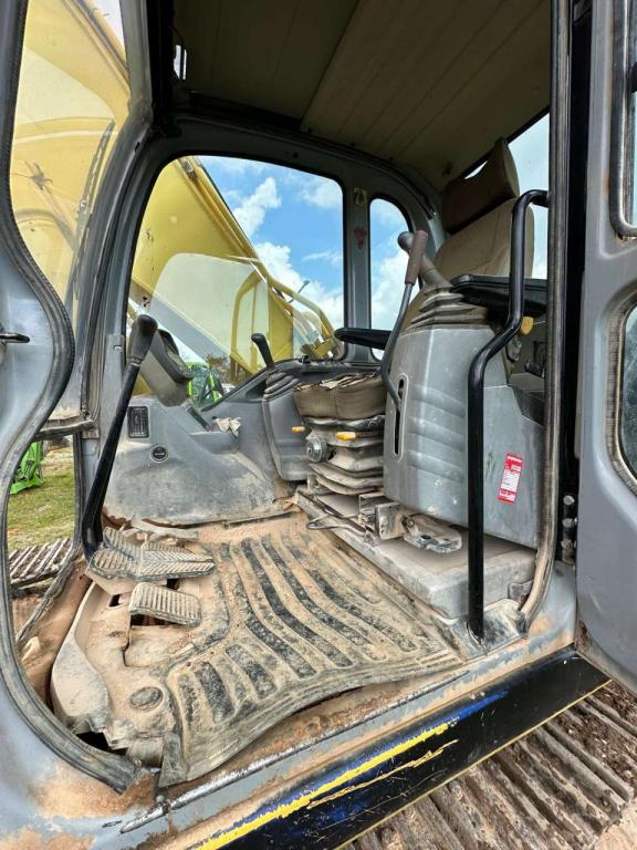 New Holland 305 Foto 2