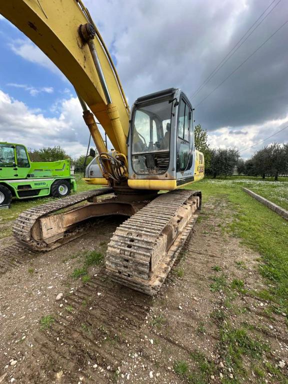 New Holland 305 Foto 3