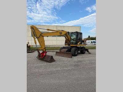 Caterpillar m312 Foto 1