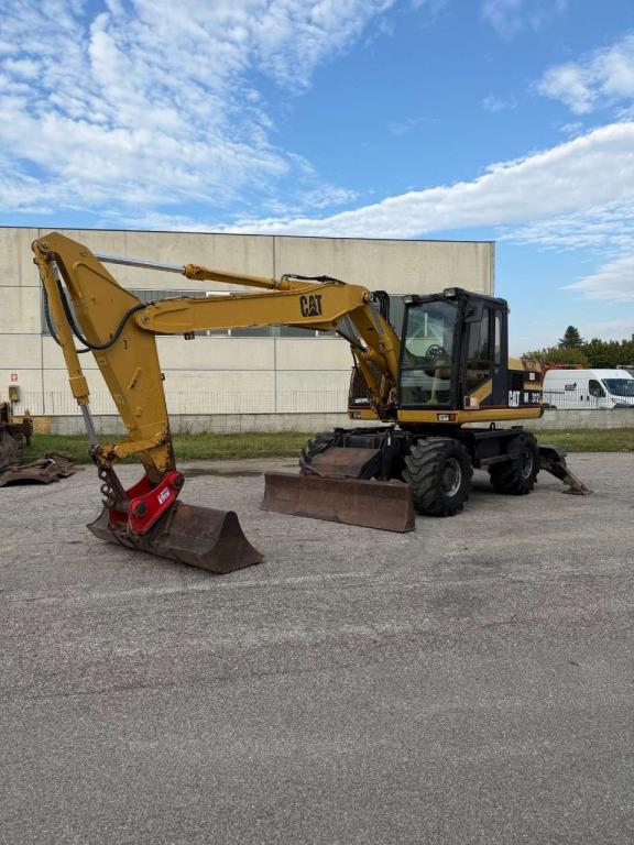 Caterpillar m312 Foto 1