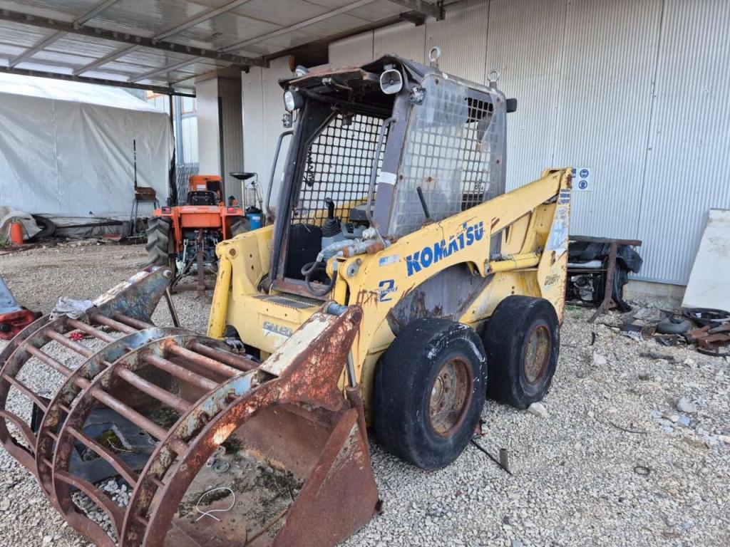 Komatsu SK714-2 Foto 1