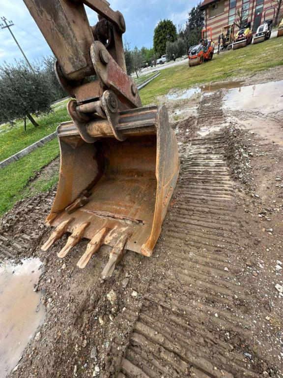 New Holland 305 Foto 10