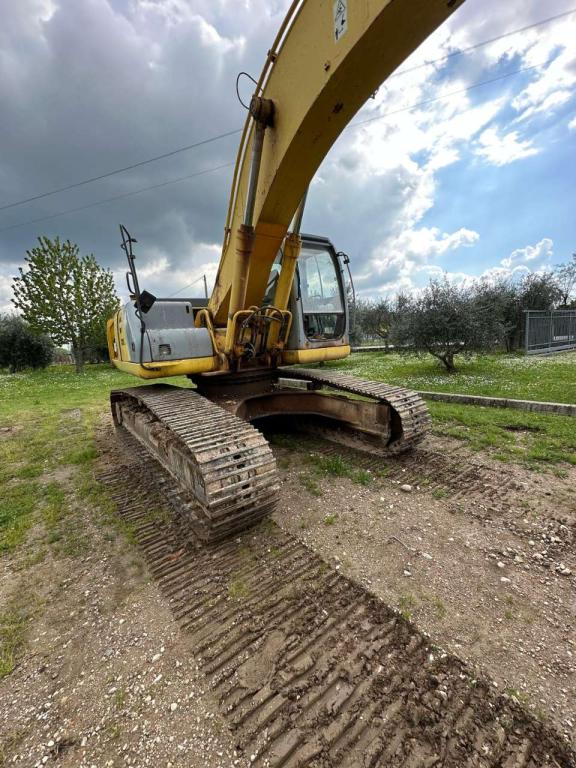 New Holland 305 Foto 8