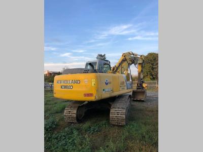 New Holland E245B vendida por K.M. Trading Srl