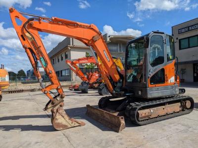 Doosan DX60r vendida por Turrini Macchine Srl