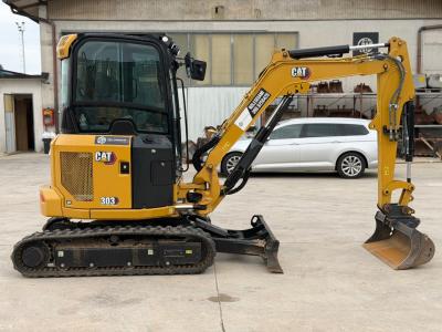 Caterpillar 303 CR Foto 1