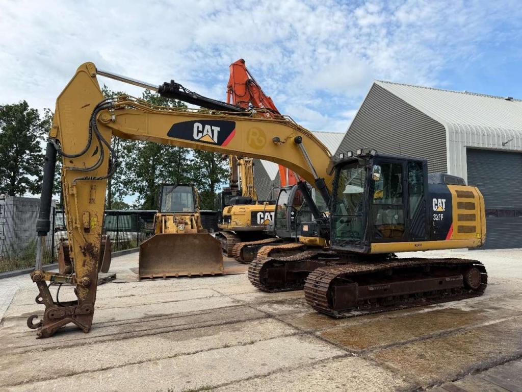 Caterpillar 323 EL Foto 1