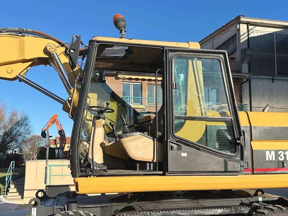 Caterpillar M315 Foto 13