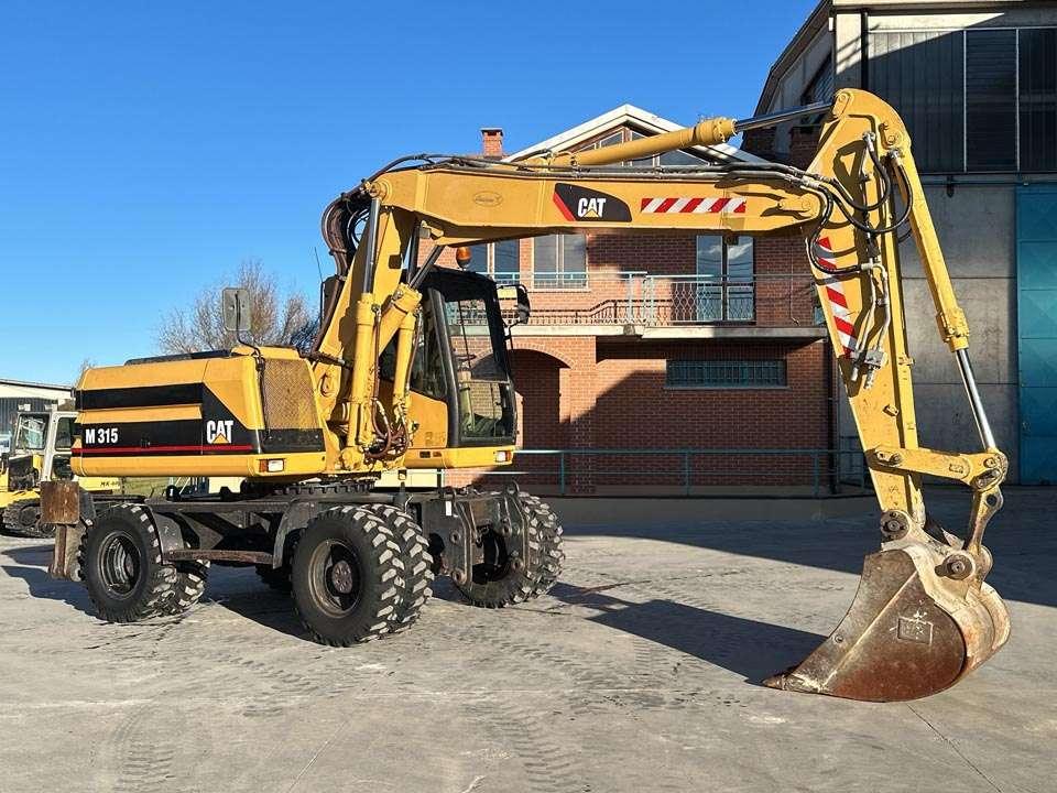 Caterpillar M315 Foto 19