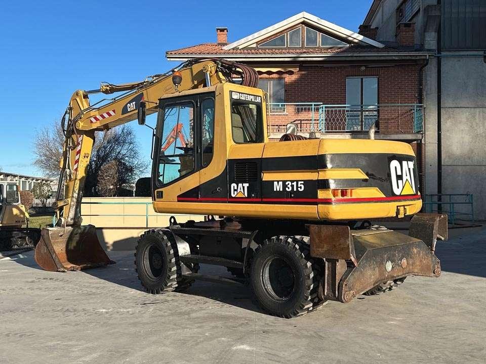 Caterpillar M315 Foto 4