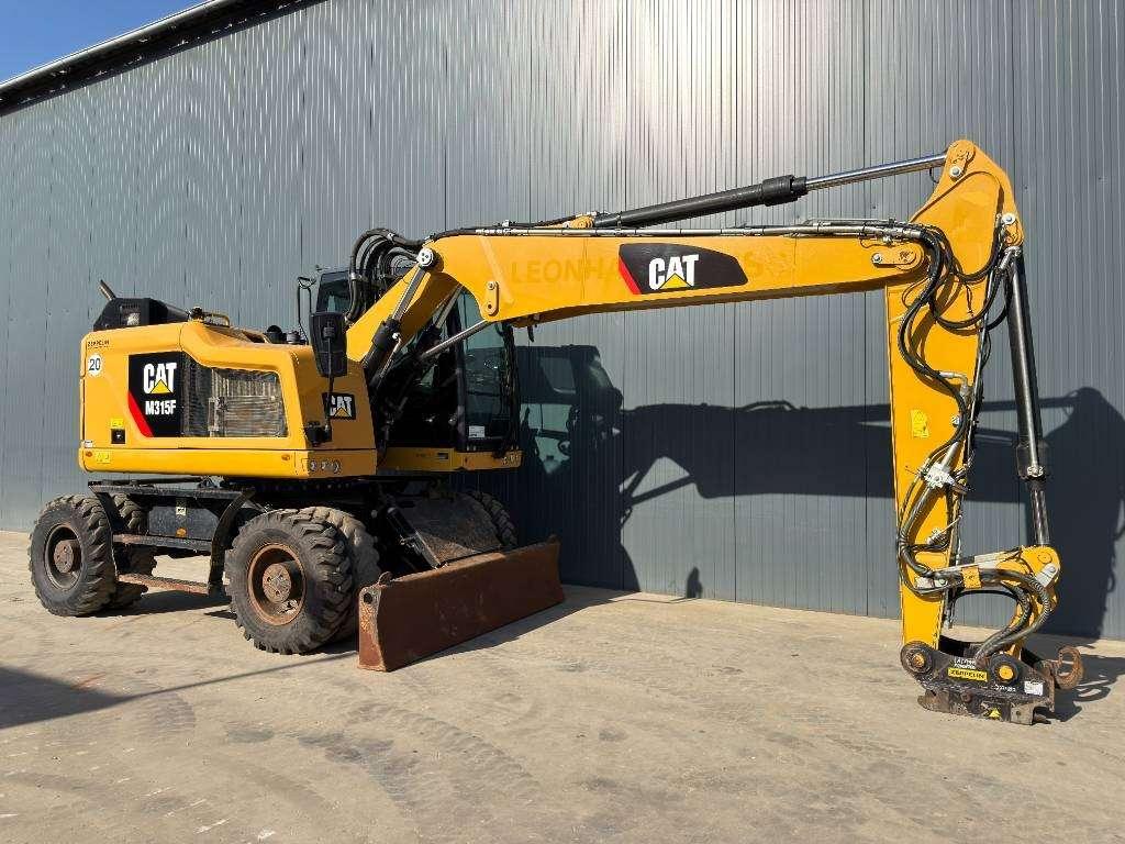 Caterpillar M315F - With OilQuick Foto 13