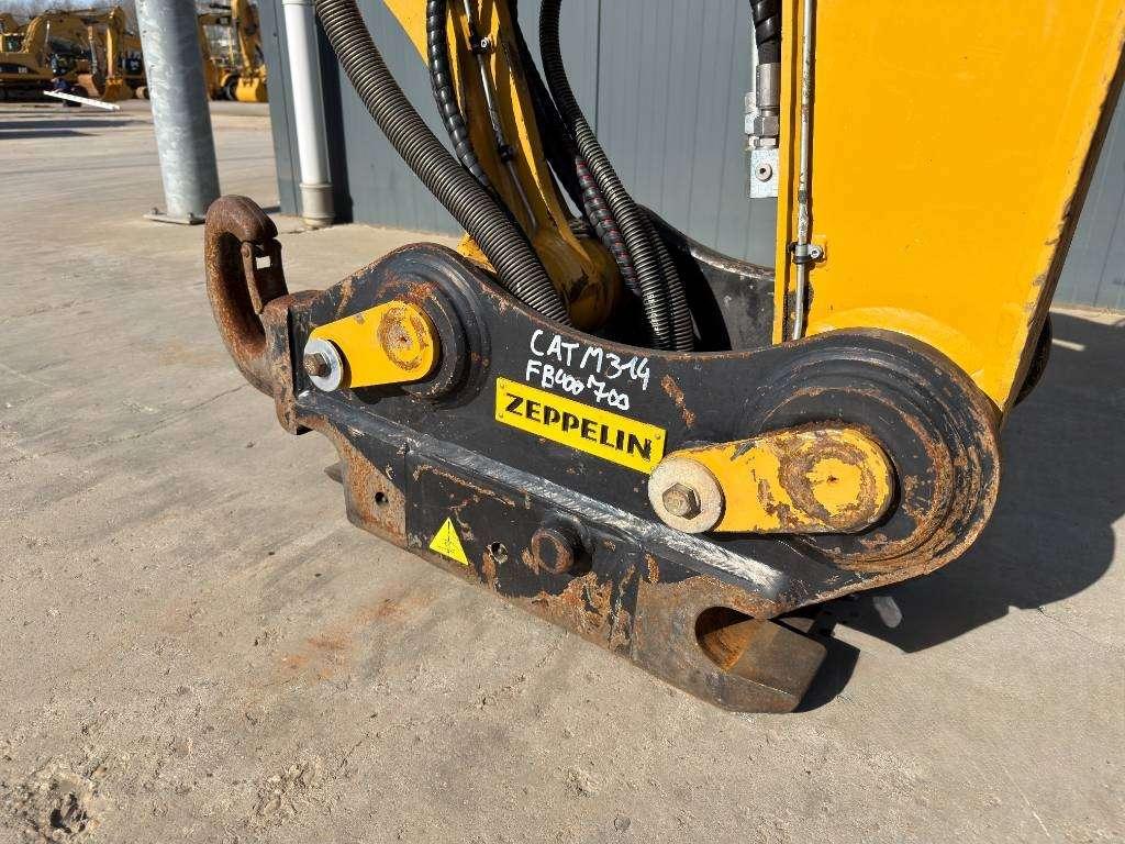 Caterpillar M315F - With OilQuick Foto 16