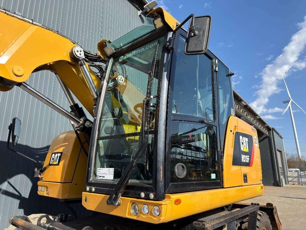 Caterpillar M315F - With OilQuick Foto 29