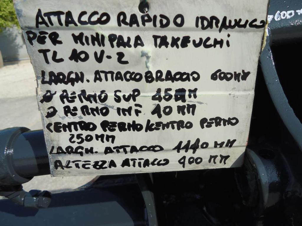 Acoplamiento rápido hidráulico para per Takeuchi TL10V-2 Foto 7