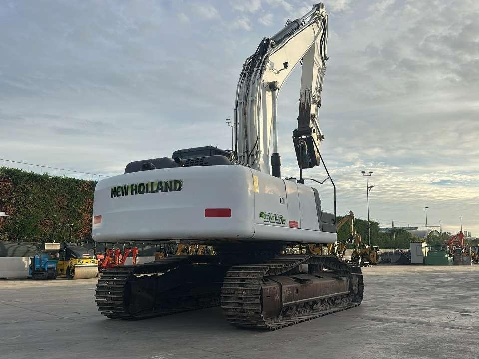 New Holland E 305 C Foto 1