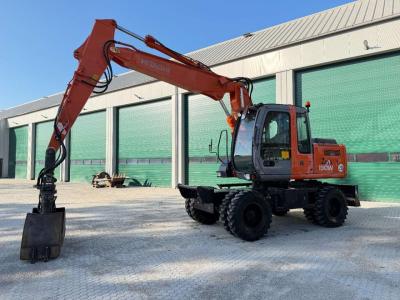 Hitachi ZX 130 W ZX130W - Grapple vendida por JN Machines BV