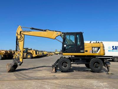 Caterpillar M313D VA - Outriggers + Blade vendida por Big Machinery