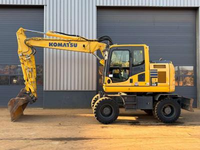Komatsu PW148-10 vendida por Big Machinery