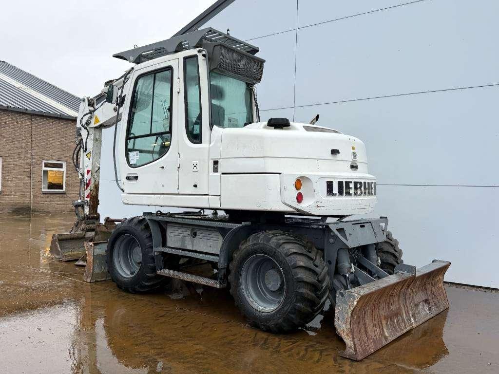 Liebherr A 309 - Hammer Lines / Quick Coupler Foto 3