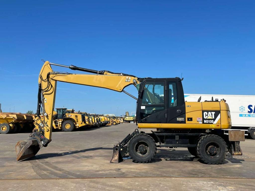 Caterpillar M313D VA - Outriggers + Blade Foto 5