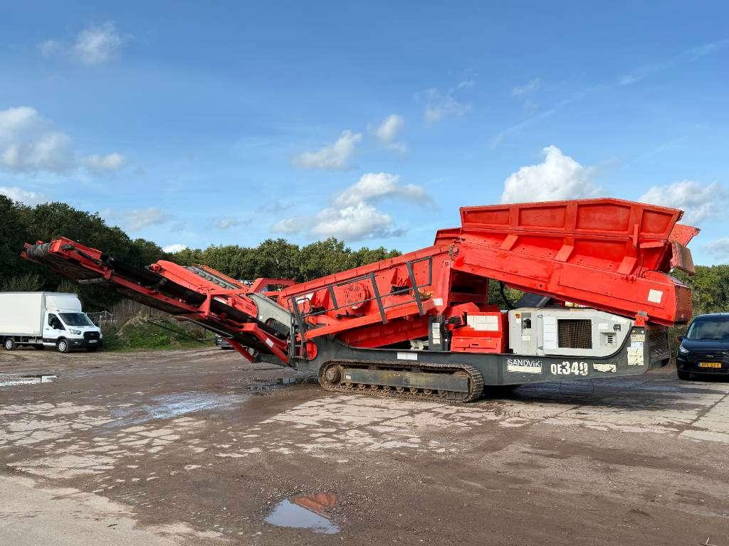 Sandvik QE340 - Caterpillar Engine / 2 Side Convey Foto 1
