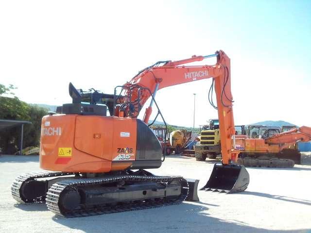 Hitachi ZX135US-6 Foto 9