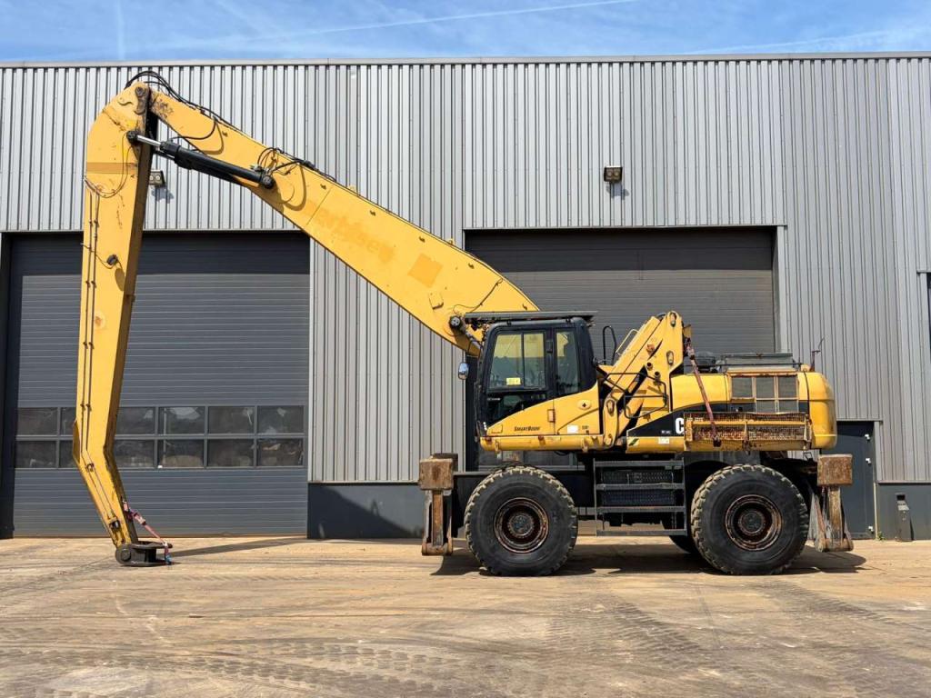 Caterpillar M325DMH Foto 1