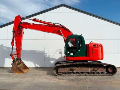 New Holland Kobelco E235B SR-2 - 360° Camera / Hammer lines vendida por Boss Machinery