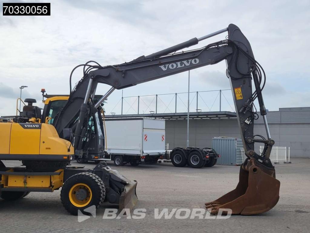 Volvo EW210 D Outrigers + Blade Foto 12
