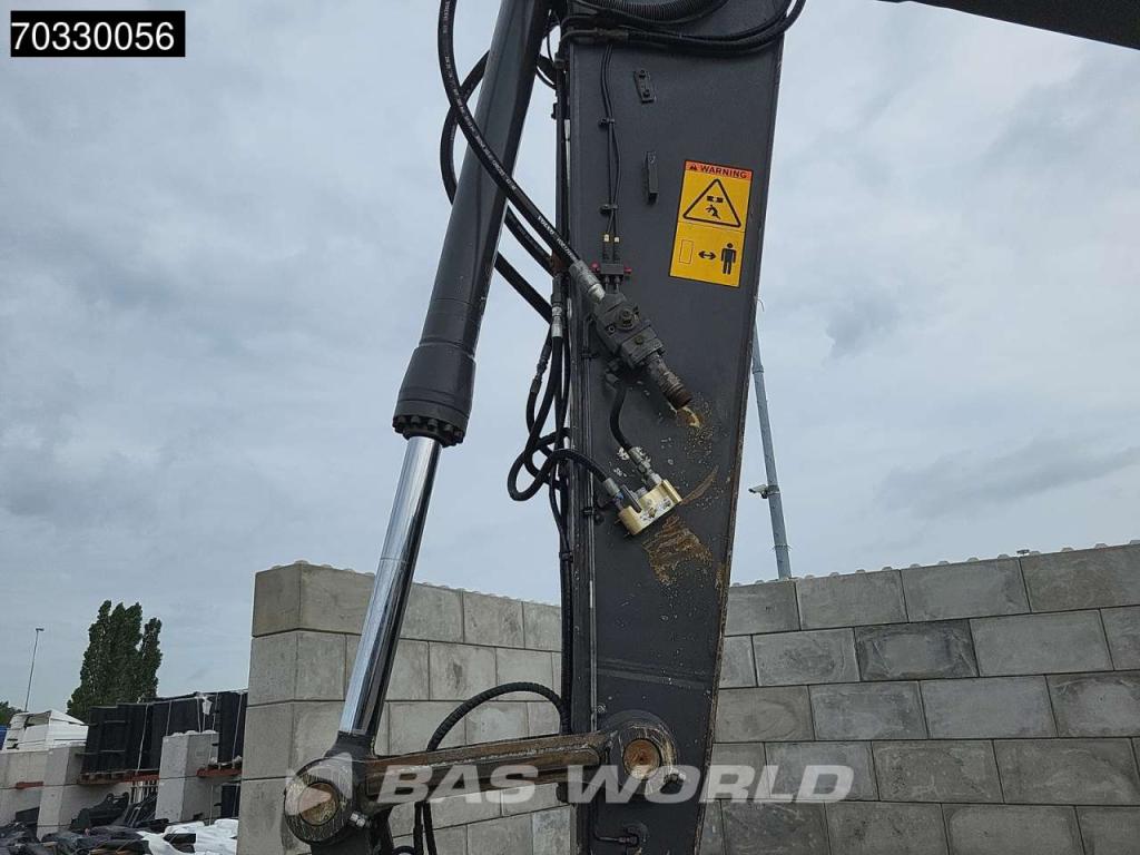 Volvo EW210 D Outrigers + Blade Foto 15