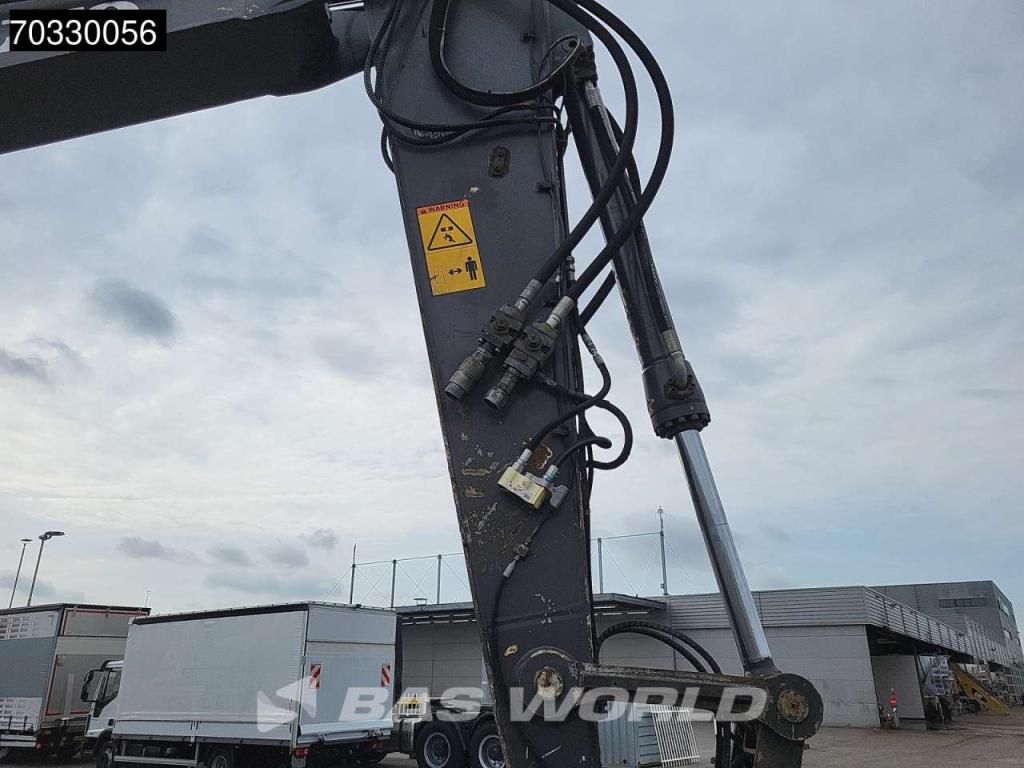 Volvo EW210 D Outrigers + Blade Foto 16