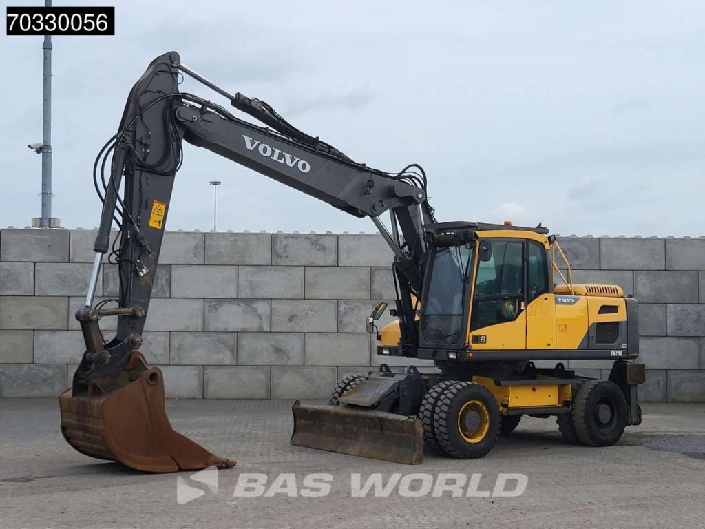 Volvo EW210 D Outrigers + Blade Foto 2