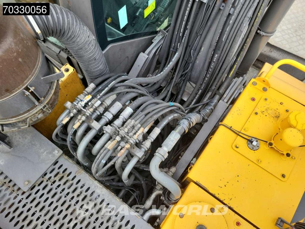 Volvo EW210 D Outrigers + Blade Foto 25