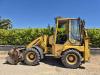 Komatsu WB70A Foto 2 thumbnail