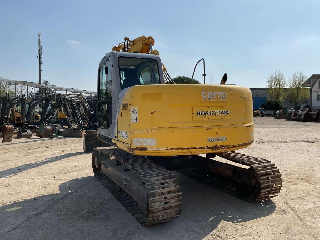 New Holland E145 Foto 3