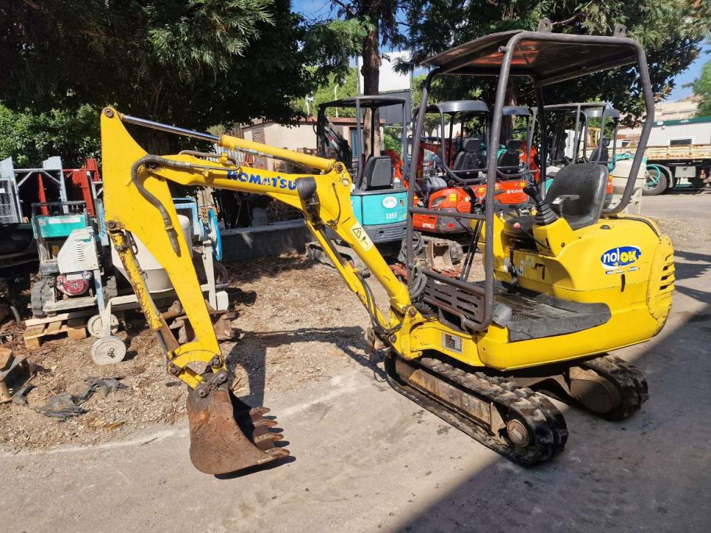Komatsu PC12 R-8 Foto 1